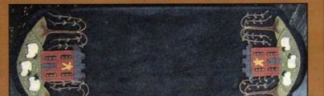 table runner with an old farmhouse at each end