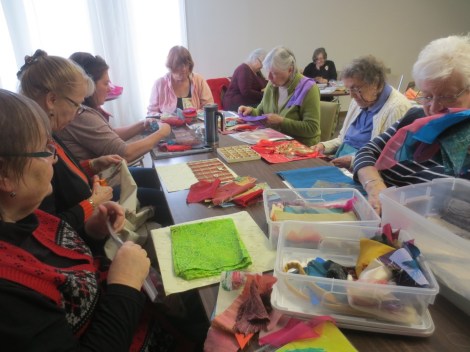 students choosing fabric