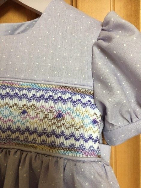 smocked panel in dress