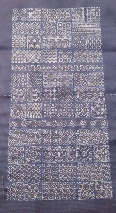 blackwork sampler done with coloured threads