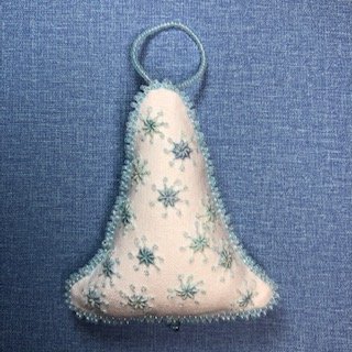 bell ornament with blue stars