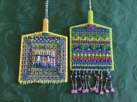 flyswatter encrusted with threads and beads