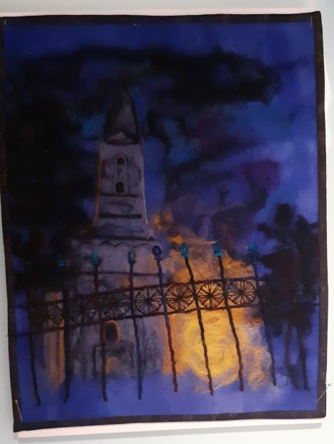 moody embroidery of building at night