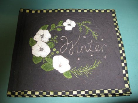 embroidery with flowers and the word Winter