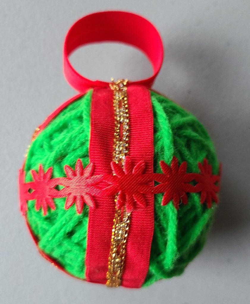 yarn covered ball with decorative trims
