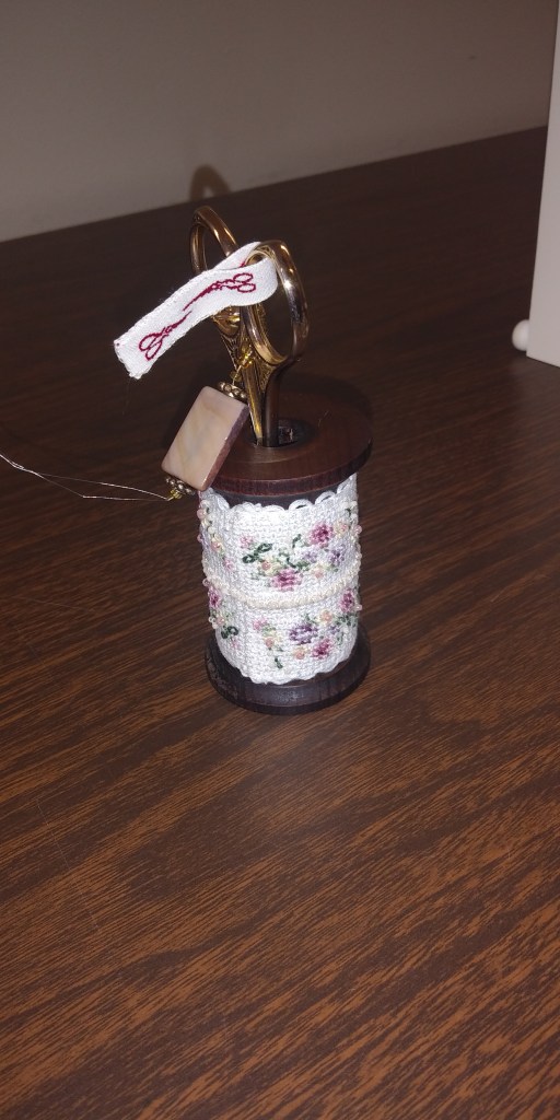 embroidery scissors in a wooden case