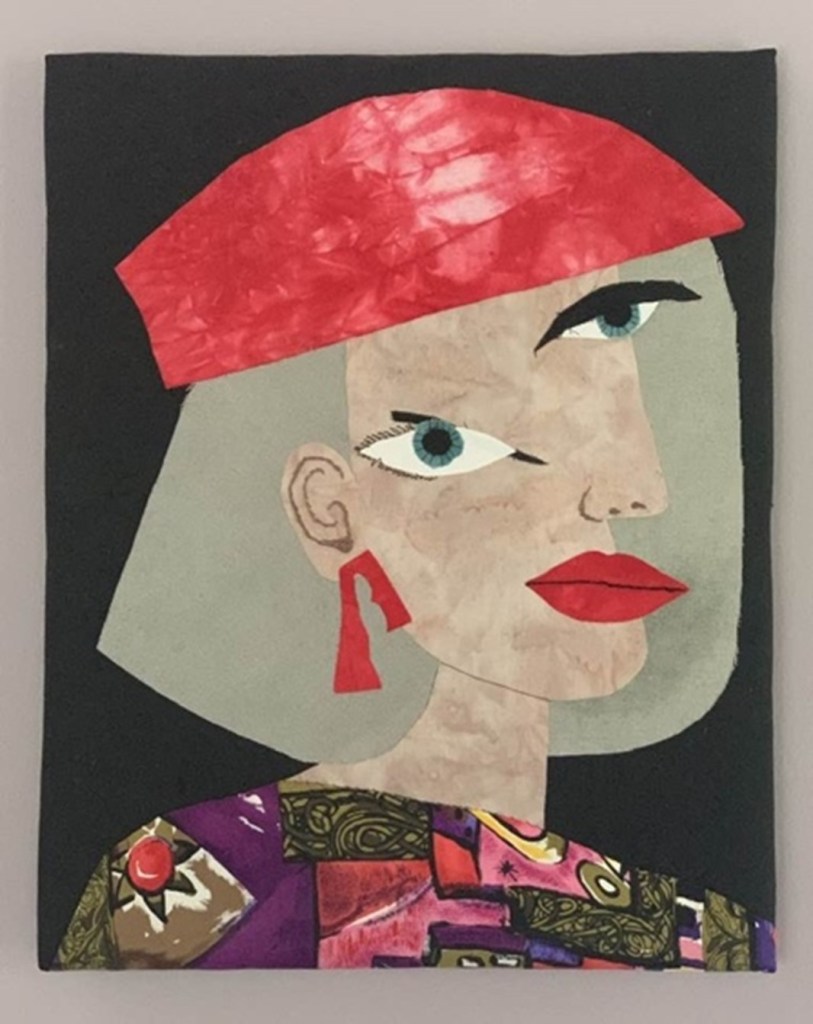 collaged woman's face with red hat