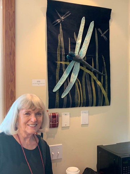 Mary and large dragonfly wall hanging