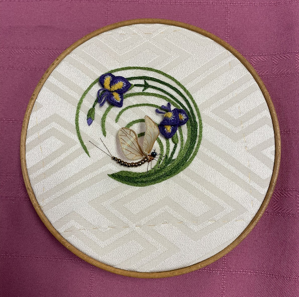 mayfly and butterflies embroidered on white