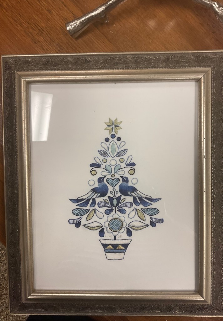 blue and white tree with 2 birds in crewel style embroidery