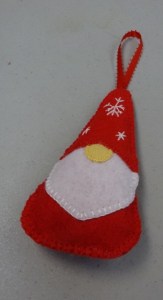 a Santa gnome ornament in felt