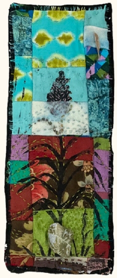 collaged fabrics implying a landscape