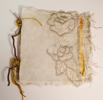 mixed media combining embroidery and found objects