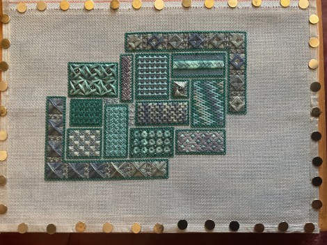 canvas work project in teal and silver; work in progress